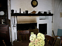 The hearth and bellows on the mantle